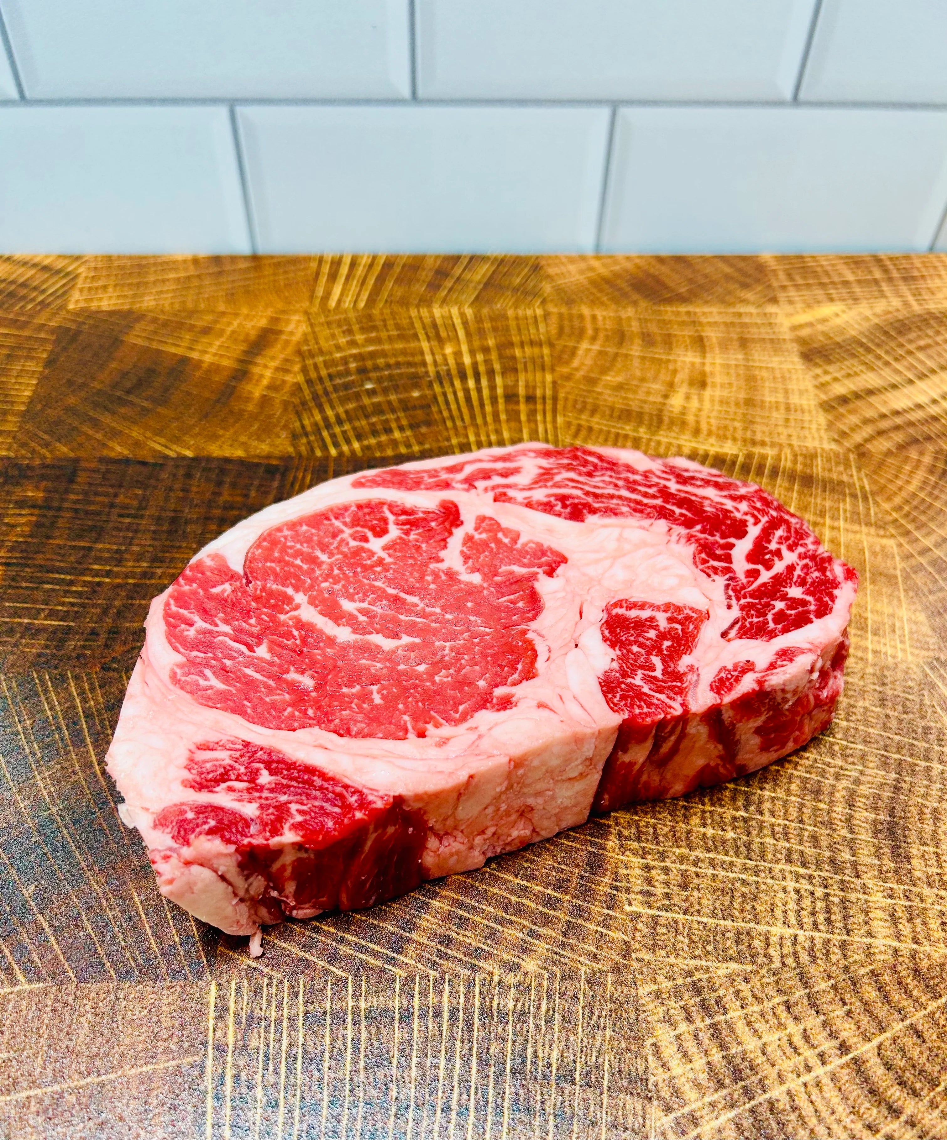CHOICE RIBEYE STEAK BONELESS 1" TAIL HEAVY 14OZ